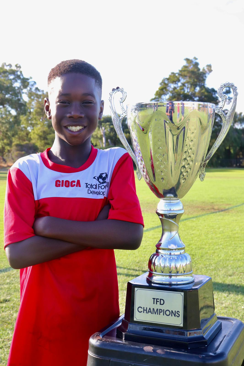 TFD Champion with trophy