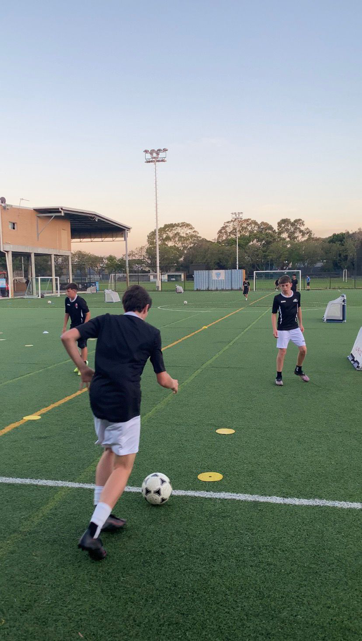 Players training on the pitch